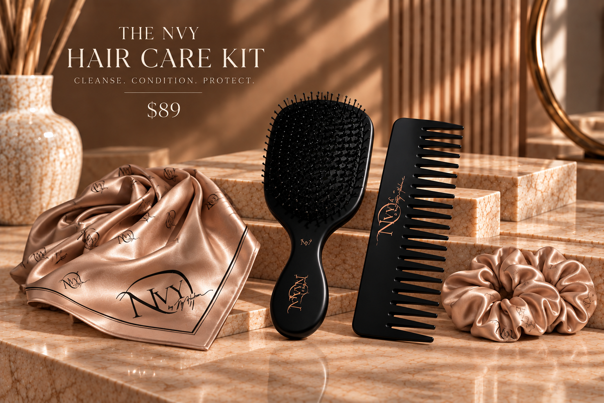 The NVY Hair Care Kit — detangling paddle brush, wide-tooth comb, satin hair scarf, and satin scrunchies